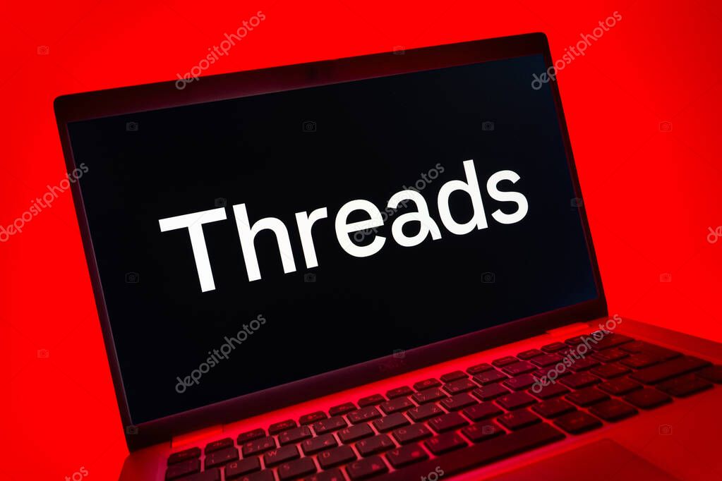 Prague, Czechia - 08 01 2025: A close-up view of a laptop screen displaying the Threads logo. Threads is a social media platform for sharing short posts and updates.