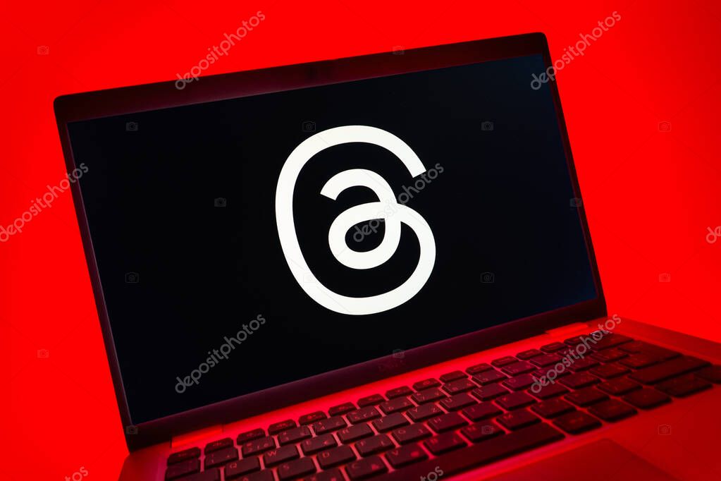 Prague, Czechia - 08 01 2025: A close-up view of a laptop screen displaying the Threads logo. Threads is a social media platform for sharing short posts and updates.