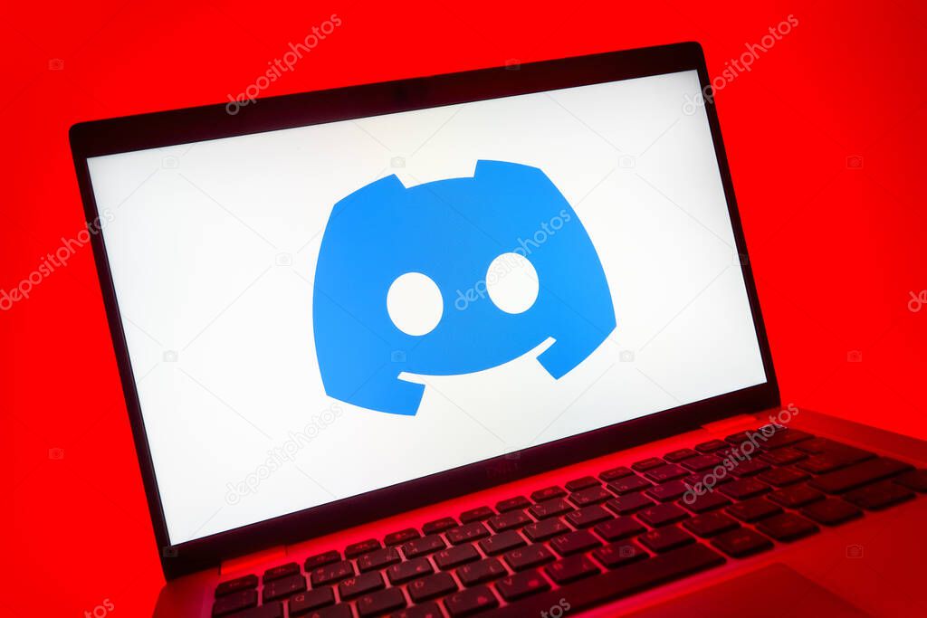 Prague, Czechia - 08 01 2025: A close-up view of a laptop screen displaying the Discord logo. Discord is a platform for voice, video, and text communication.