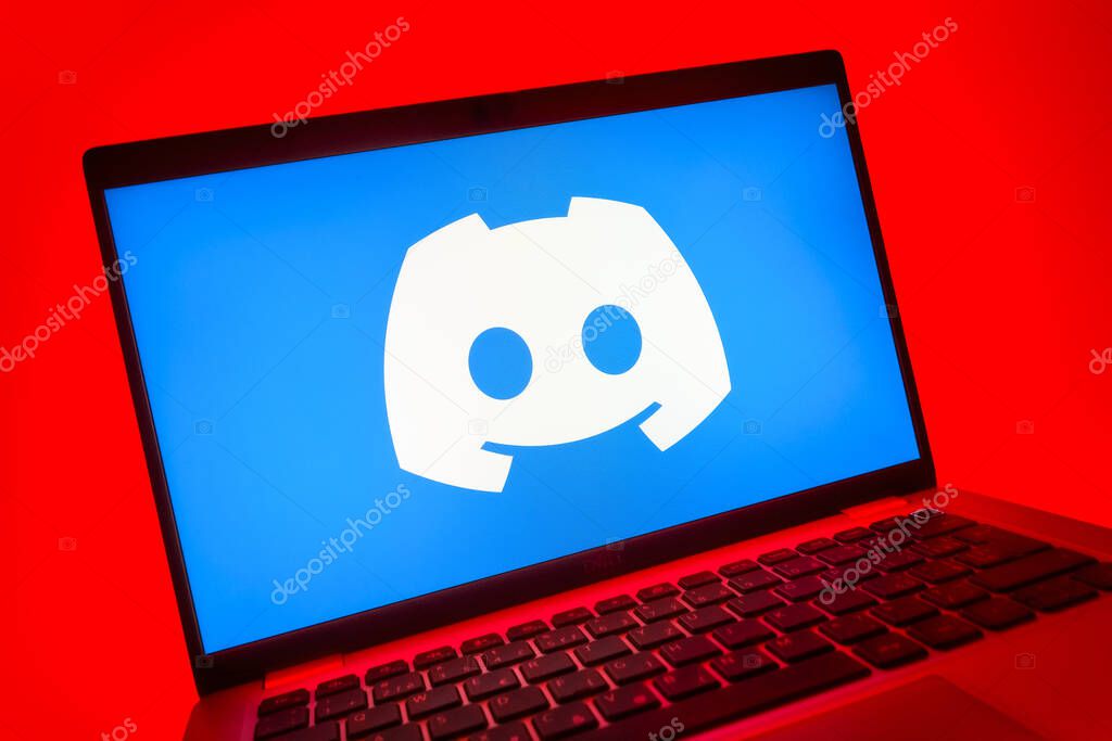 Prague, Czechia - 08 01 2025: A close-up view of a laptop screen displaying the Discord logo. Discord is a platform for voice, video, and text communication.
