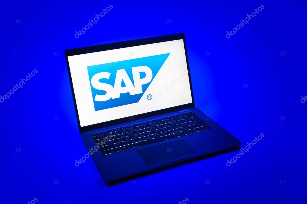 Prague, Czechia - 08 12 2025: A top-down view of a laptop on a uniform background displaying the SAP logo. SAP is a software company providing enterprise applications and solutions.
