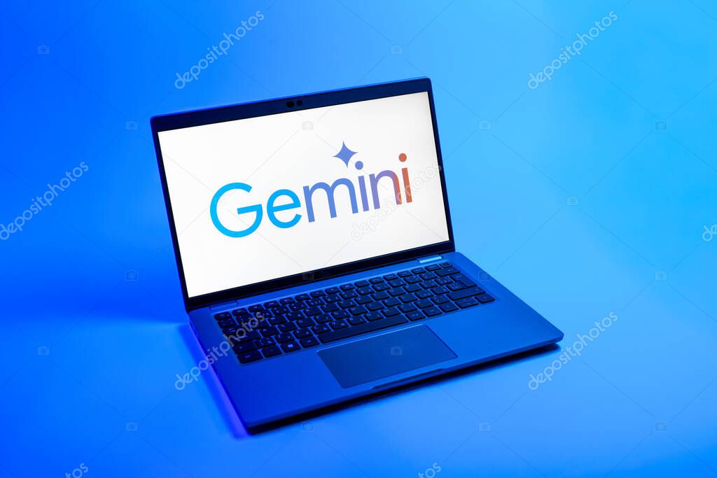 Prague, Czechia - 08 12 2025: A top-down view of a laptop on a uniform background displaying the Gemini logo. Gemini is a platform for cryptocurrency trading and management.