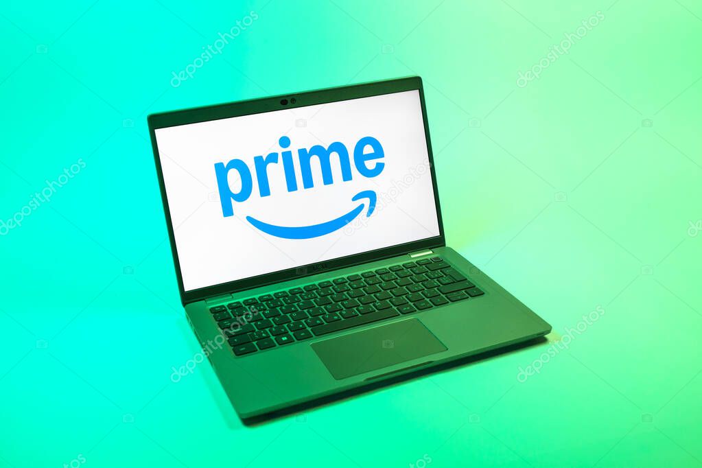 Prague, Czechia - 08 12 2025: A top-down view of a laptop on a uniform background displaying the Prime logo. Prime is a subscription service for shopping, streaming, and benefits.