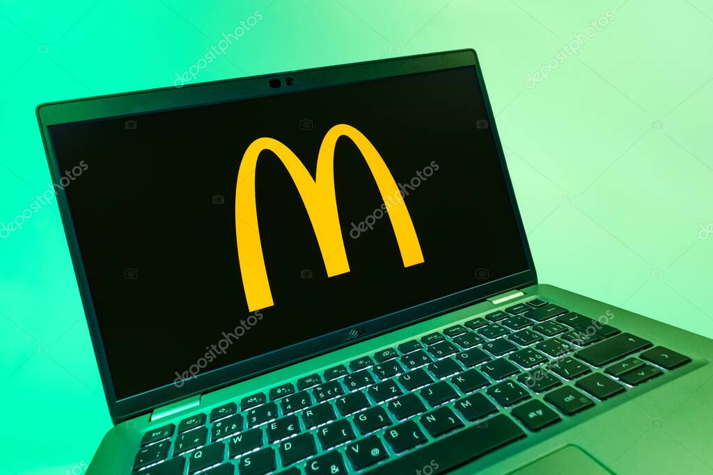 Prague, Czechia - 08 12 2025: A dynamic close-up of a laptop displaying the McDonalds logo. McDonalds is a fast-food chain serving burgers, fries, and more.