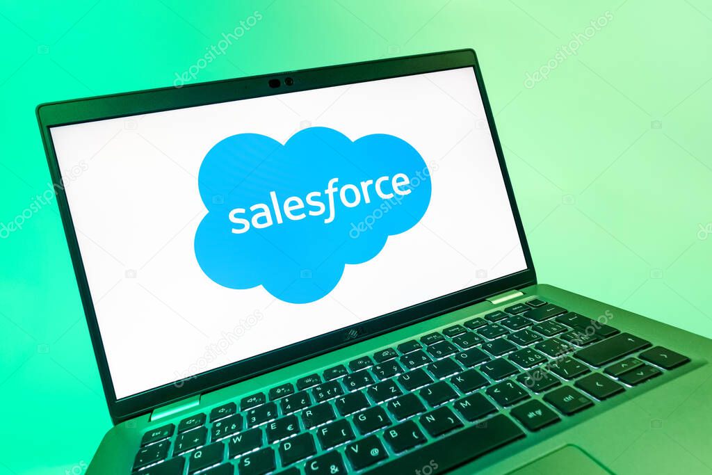 Prague, Czechia - 08 12 2025: A dynamic close-up of a laptop displaying the Salesforce logo. Salesforce is a platform for customer relationship management and cloud services.