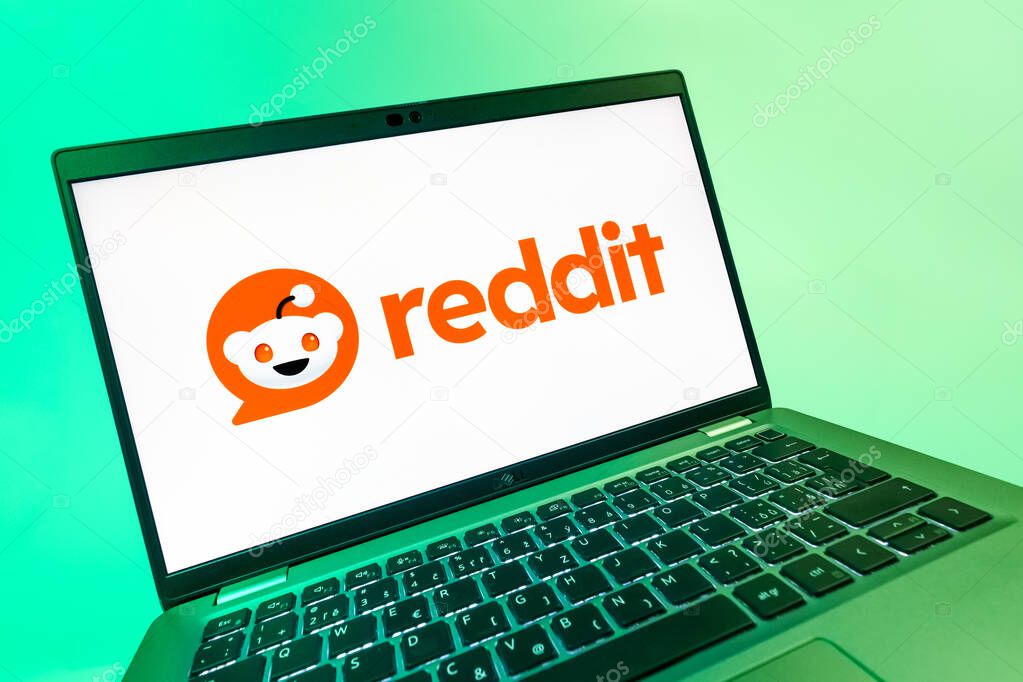 Prague, Czechia - 08 12 2025: A dynamic close-up of a laptop displaying the Reddit logo. Reddit is a platform for discussion, news, and community content.