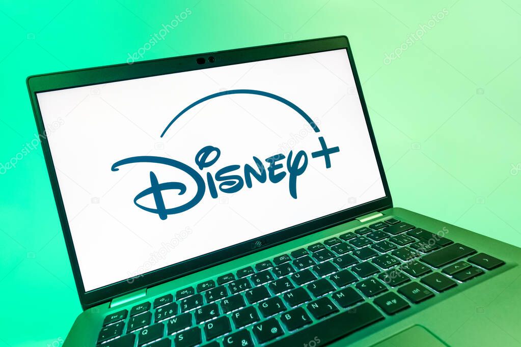 Prague, Czechia - 08 12 2025: A dynamic close-up of a laptop displaying the Disney+ logo. Disney + is a streaming platform for movies and TV shows.