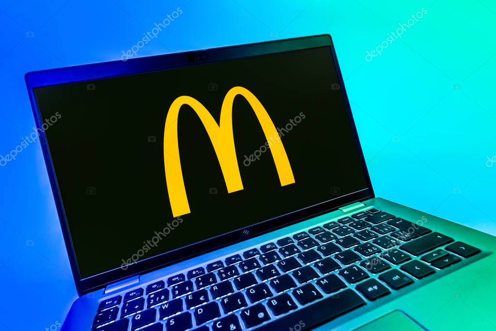 Prague, Czechia - 08 12 2025: A dynamic close-up of a laptop displaying the McDonalds logo. McDonalds is a fast-food chain serving burgers, fries, and more.