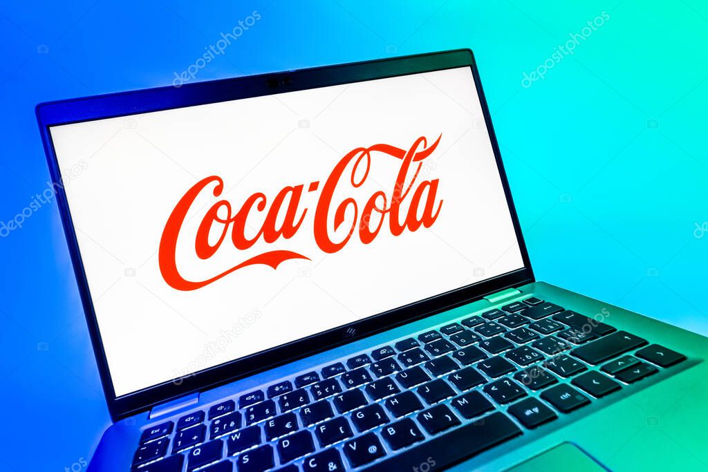 Prague, Czechia - 08 12 2025: A dynamic close-up of a laptop displaying the Coca-Cola logo. Coca-Cola is a beverage company known for its soft drinks.