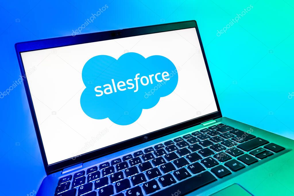 Prague, Czechia - 08 12 2025: A dynamic close-up of a laptop displaying the Salesforce logo. Salesforce is a platform for customer relationship management and cloud services.