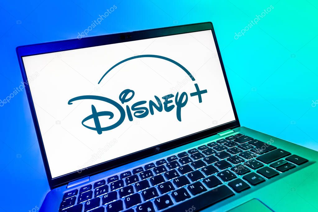 Prague, Czechia - 08 12 2025: A dynamic close-up of a laptop displaying the Disney+ logo. Disney + is a streaming platform for movies and TV shows.