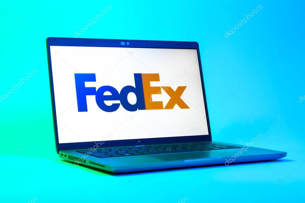 Prague, Czechia - 05 18 2025: A low-angle view of a laptop displaying FedEX logo. FedEX is a logistics company providing shipping and courier services.