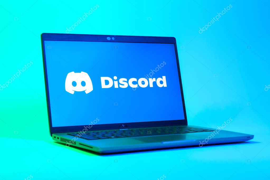 Prague, Czechia - 05 18 2025: A low-angle view of a laptop displaying Discord logo. Discord is a platform for voice, video, and text communication.