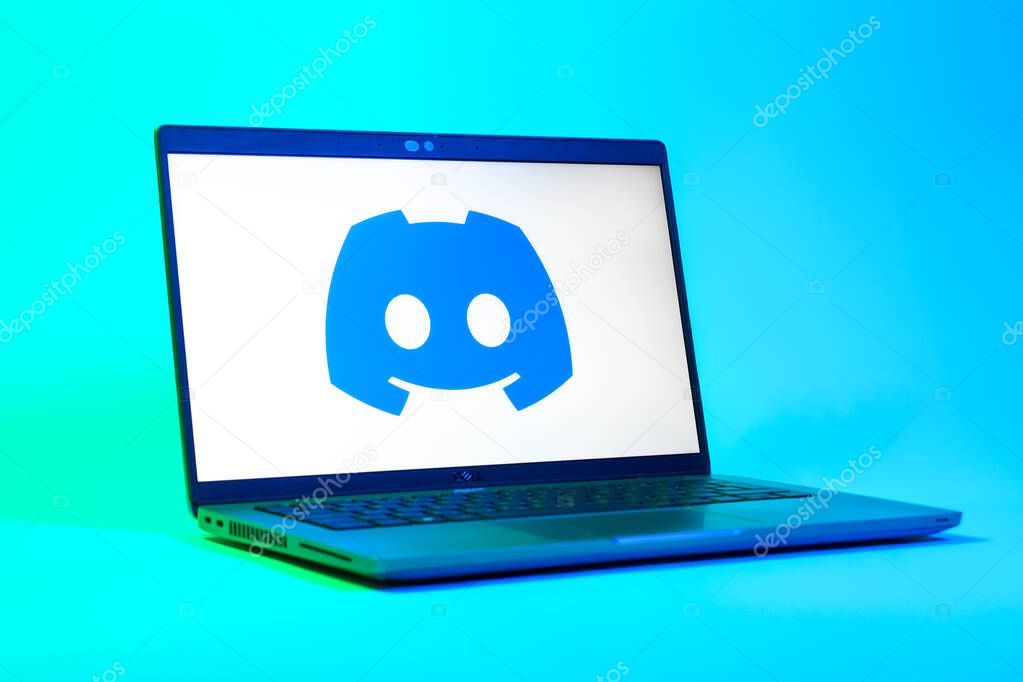 Prague, Czechia - 05 18 2025: A low-angle view of a laptop displaying Discord logo. Discord is a platform for voice, video, and text communication.