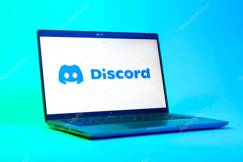 Prague, Czechia - 05 18 2025: A low-angle view of a laptop displaying Discord logo. Discord is a platform for voice, video, and text communication.