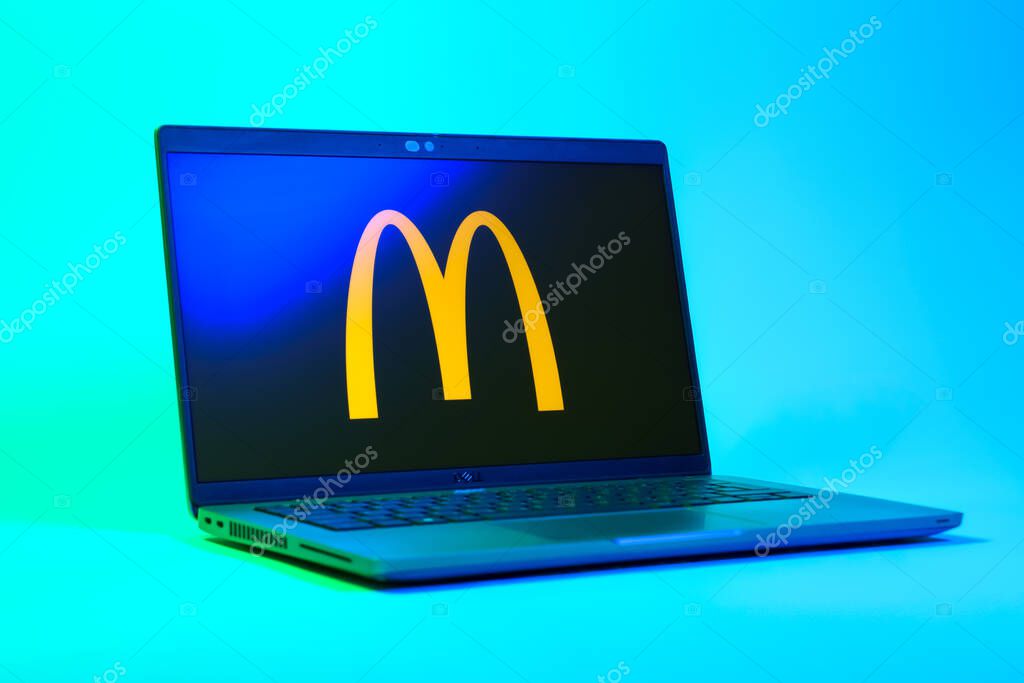 Prague, Czechia - 05 18 2025: A low-angle view of a laptop displaying McDonalds logo. McDonalds is a fast-food chain serving burgers, fries, and more.