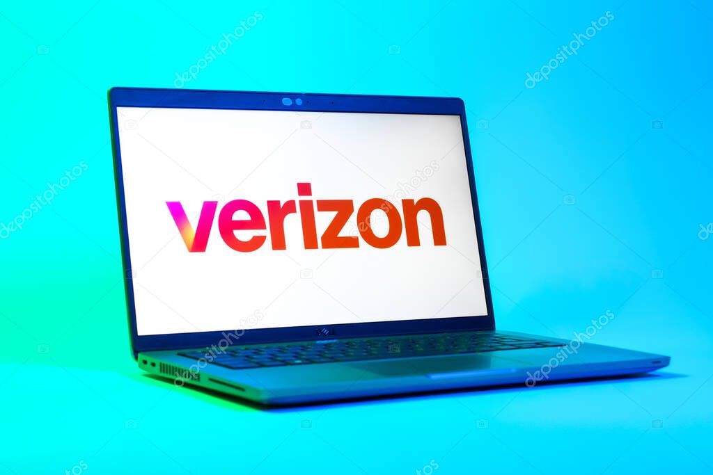 Prague, Czechia - 05 18 2025: A low-angle view of a laptop displaying Verizon logo. Verizon is a telecom company providing wireless and broadband services.