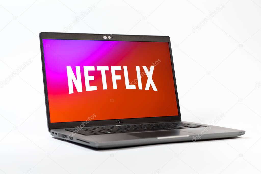 Prague, Czechia - 05 18 2025: A low-angle view of a laptop displaying Netflix logo. Netflix is a streaming platform for movies and TV shows.