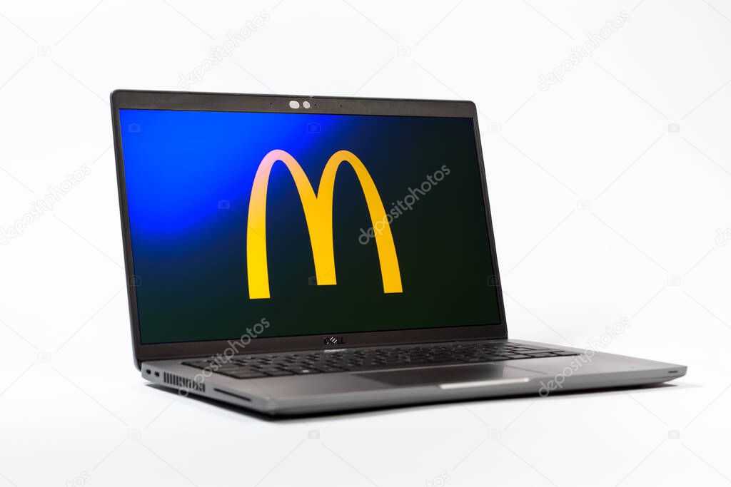 Prague, Czechia - 05 18 2025: A low-angle view of a laptop displaying McDonalds logo. McDonalds is a fast-food chain serving burgers, fries, and more.