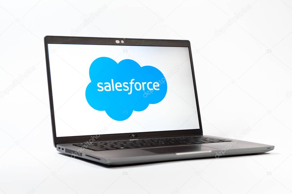 Prague, Czechia - 05 18 2025: A low-angle view of a laptop displaying Salesforce logo. Salesforce is a platform for customer relationship management and cloud services.