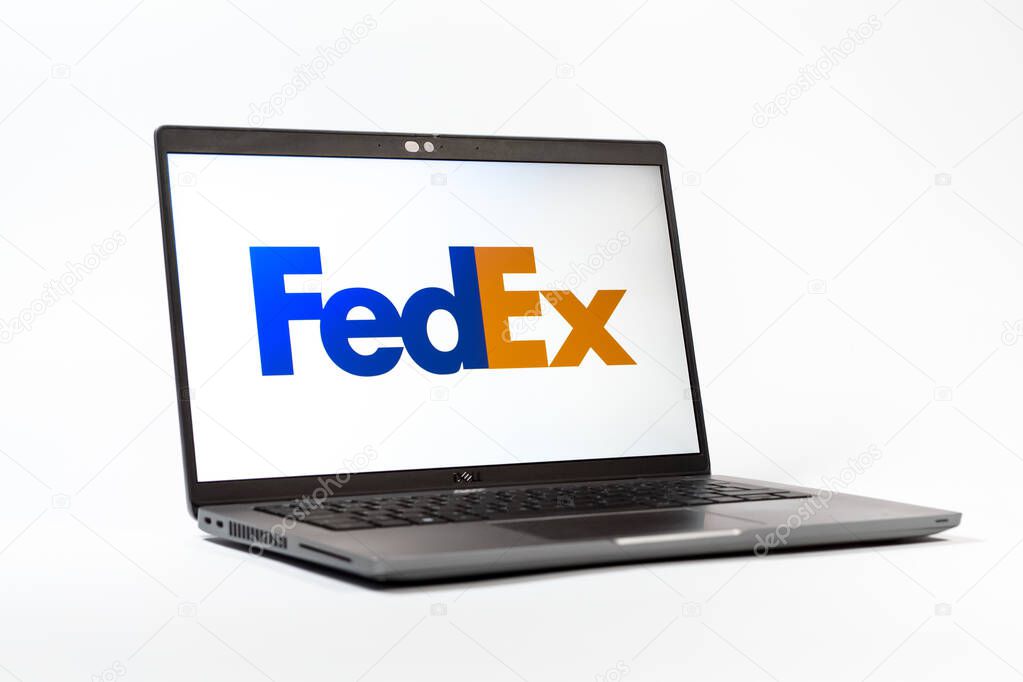 Prague, Czechia - 05 18 2025: A low-angle view of a laptop displaying FedEX logo. FedEX is a logistics company providing shipping and courier services.