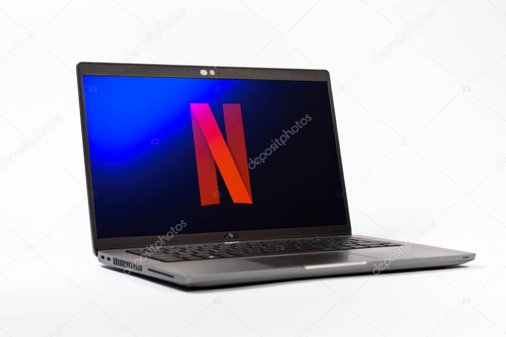 Prague, Czechia - 05 18 2025: A low-angle view of a laptop displaying Netflix logo. Netflix is a streaming platform for movies and TV shows.