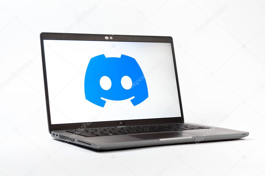Prague, Czechia - 05 18 2025: A low-angle view of a laptop displaying Discord logo. Discord is a platform for voice, video, and text communication.