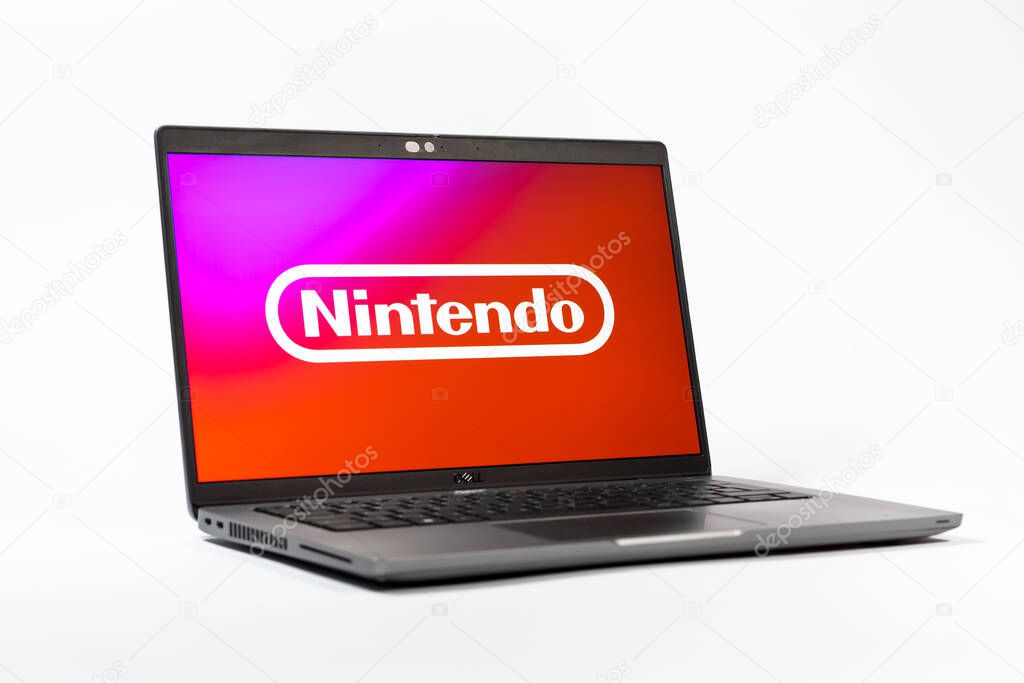 Prague, Czechia - 05 18 2025: A low-angle view of a laptop displaying Nintendo logo. Nintendo is a company producing video game consoles and games.