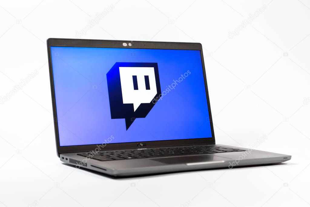 Prague, Czechia - 05 18 2025: A low-angle view of a laptop displaying Twitch logo. Twitch is a platform for live streaming games and content.
