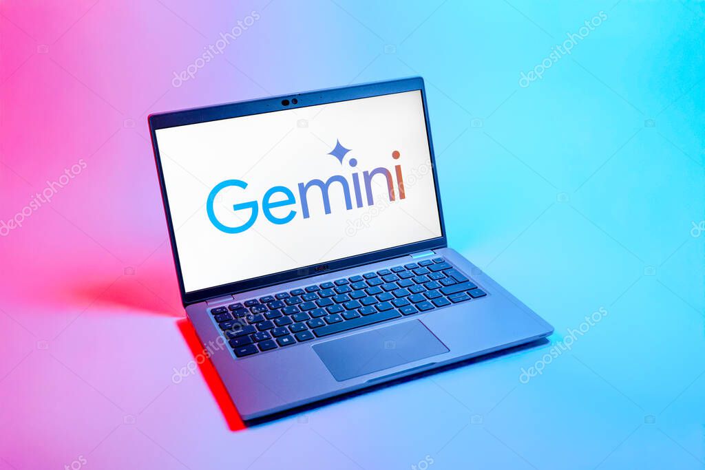 Prague, Czechia - 08 12 2025: A top-down view of a laptop on a uniform background displaying the Gemini logo. Gemini is a platform for cryptocurrency trading and management.