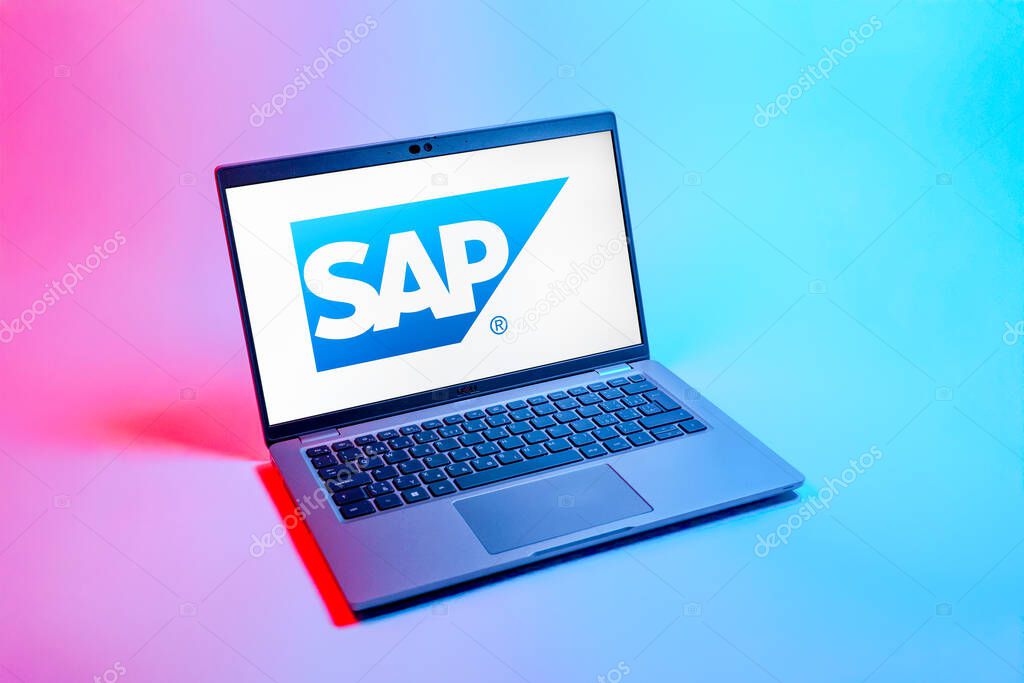 Prague, Czechia - 08 12 2025: A top-down view of a laptop on a uniform background displaying the SAP logo. SAP is a software company providing enterprise applications and solutions.