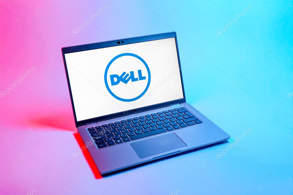 Prague, Czechia - 08 12 2025: A top-down view of a laptop on a uniform background displaying the Dell logo. Dell is a technology company producing computers and IT solutions.