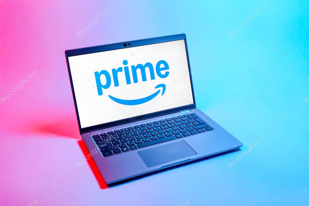 Prague, Czechia - 08 12 2025: A top-down view of a laptop on a uniform background displaying the Prime logo. Prime is a subscription service for shopping, streaming, and benefits.
