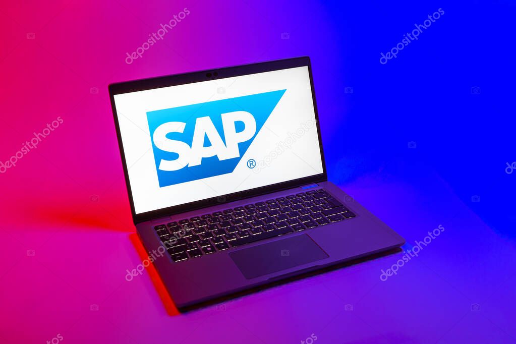 Prague, Czechia - 08 12 2025: A top-down view of a laptop on a uniform background displaying the SAP logo. SAP is a software company providing enterprise applications and solutions.