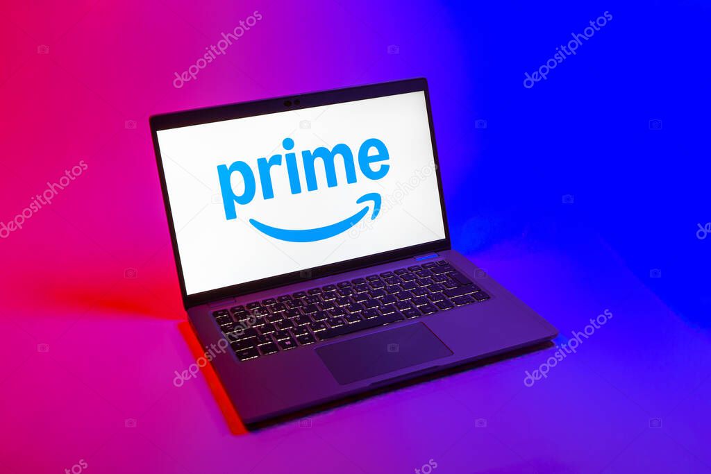 Prague, Czechia - 08 12 2025: A top-down view of a laptop on a uniform background displaying the Prime logo. Prime is a subscription service for shopping, streaming, and benefits.