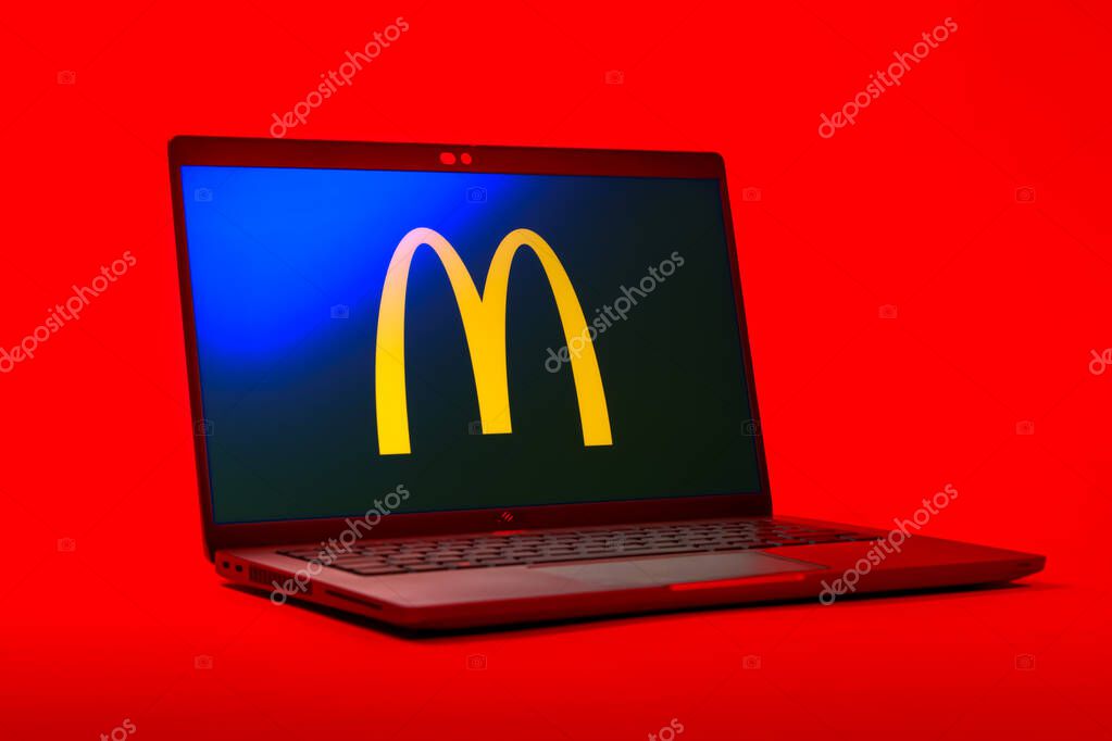 Prague, Czechia - 05 18 2025: A low-angle view of a laptop displaying McDonalds logo. McDonalds is a fast-food chain serving burgers, fries, and more.