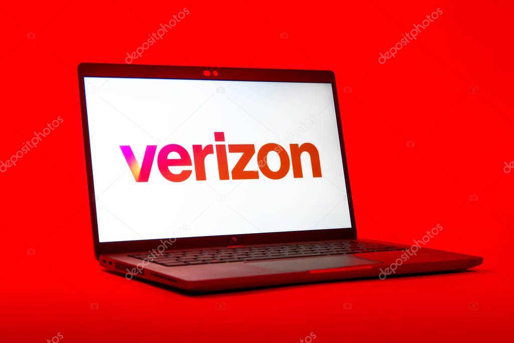 Prague, Czechia - 05 18 2025: A low-angle view of a laptop displaying Verizon logo. Verizon is a telecom company providing wireless and broadband services.
