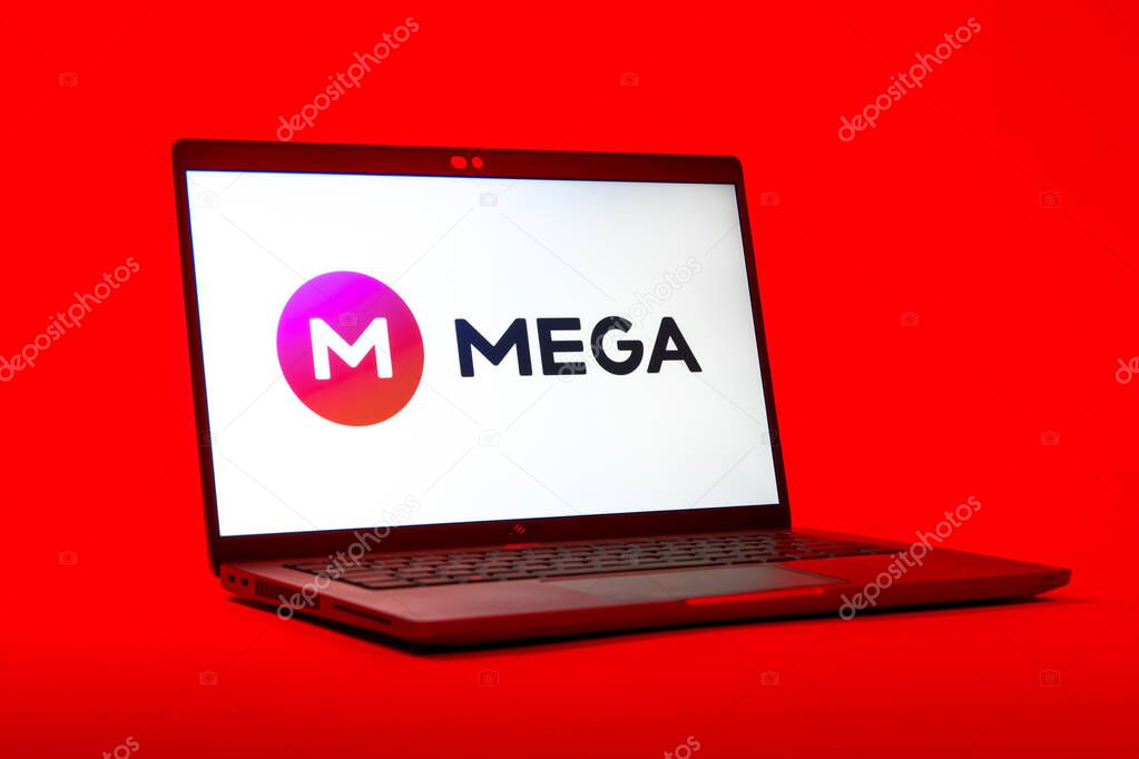 Prague, Czechia - 05 18 2025: A low-angle view of a laptop displaying Mega logo. Mega is a platform for cloud storage with encrypted file sharing.