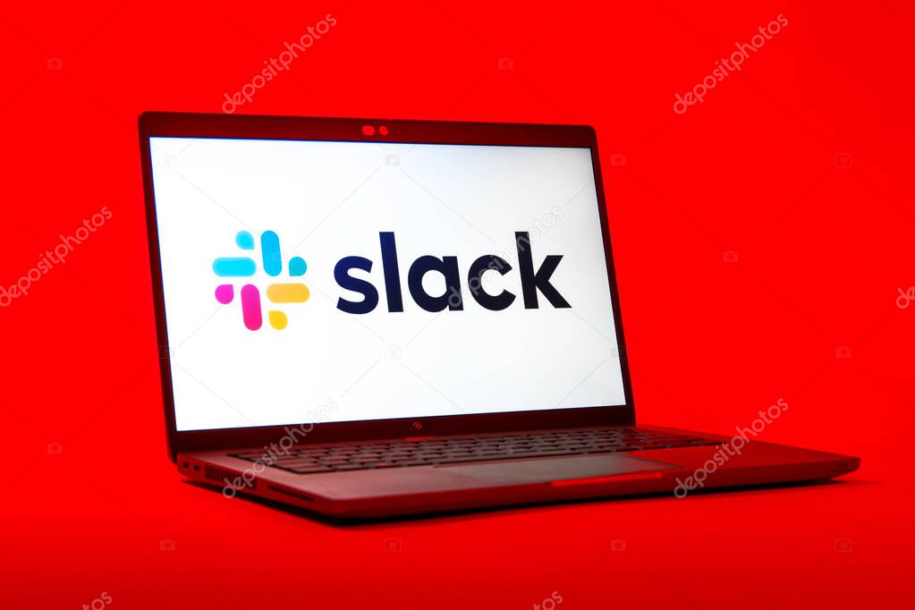 Prague, Czechia - 05 18 2025: A low-angle view of a laptop displaying Slack logo. Slack is a platform for team messaging and workplace communication.
