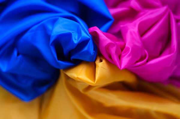 Три разных цвета синтетическая подкладка ткани с фоном
