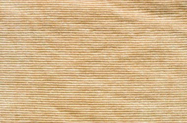 Doku bej kadife elbise. Arka plan olarak kadife tekstil kumaş