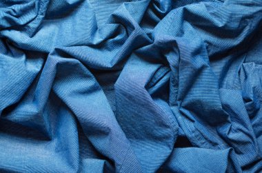 Buruşuk doku gömlek için mavi kumaş. Boş Tekstil arka plan