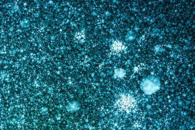 Mavi sünger köpük doku makro arka plan. Arka plan sünger ince bir tabaka. Yarı saydam malzeme. Lifler