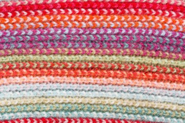 Çok renkli örgü süveter kumaş dokusu