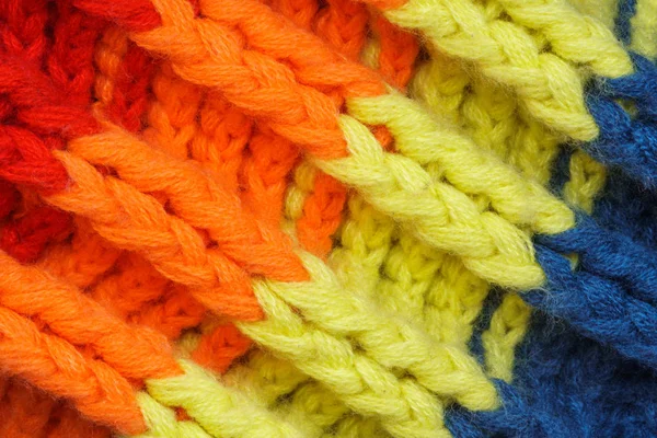 Разноцветная ткань свитера трикотаж — стоковое фото