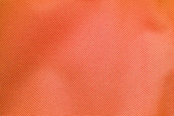 橙色尼龙织物纹理背景 — 图库照片