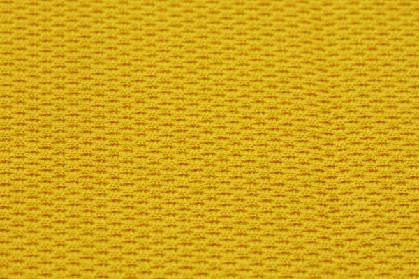 Yellow mesh texture of sports backpack