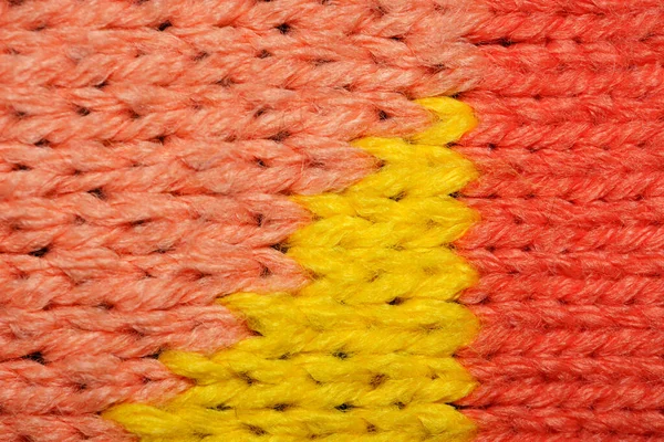 Žlutá a červená syntetická pletená textura — Stock fotografie