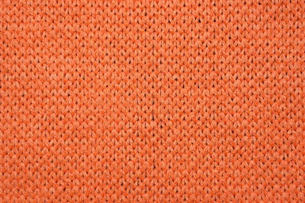 Red synthetic knitted fabric texture — Stock Photo, Image