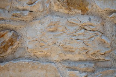 Doğal Tasarım İçin Pürüzlü Yüzeylere sahip Taş Duvarın Yakın Dokuları